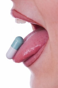 Pill On Tongue