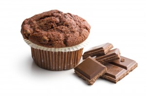 chocolate muffin with chocolate on white background
